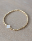 Gold Bead with Mother of Pearl Accent